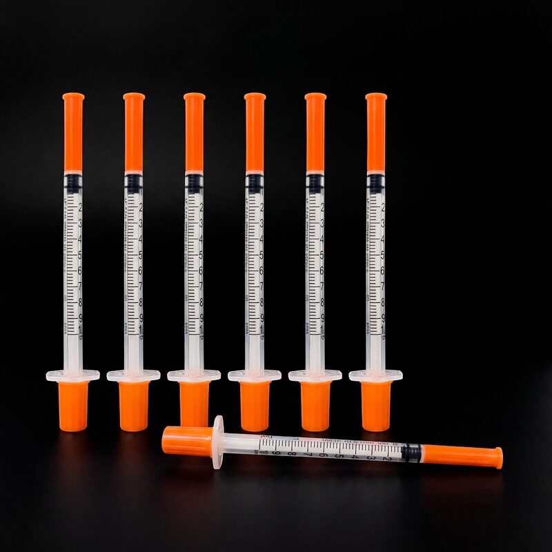 Insulin syringes with orange caps