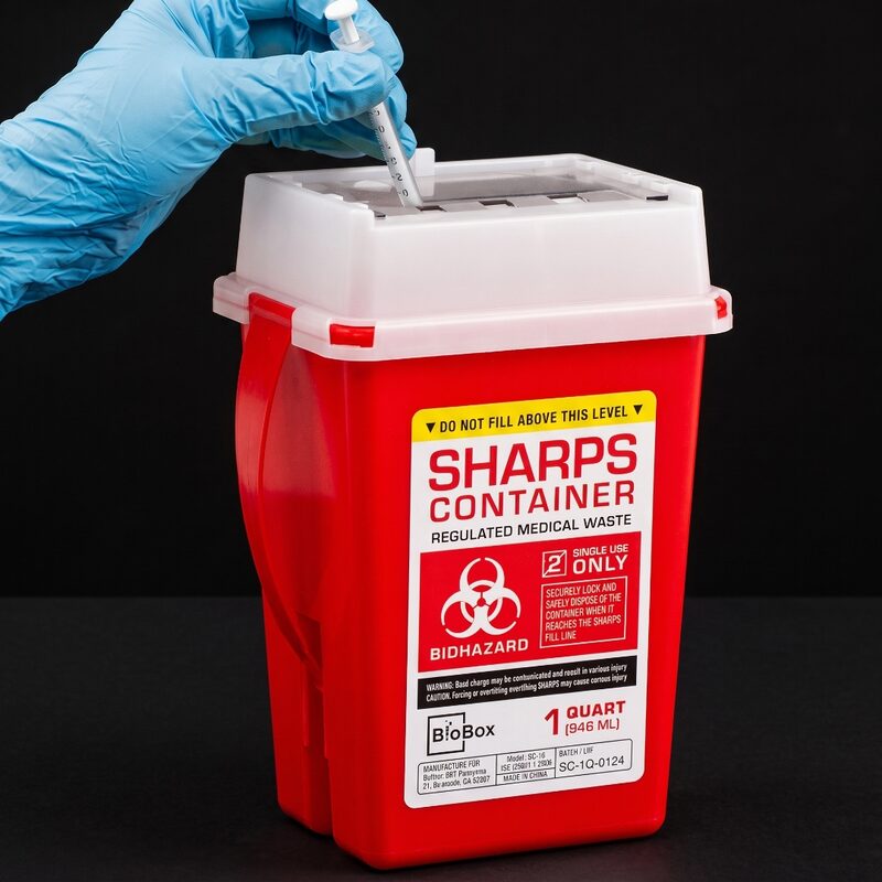 Red sharps disposal container